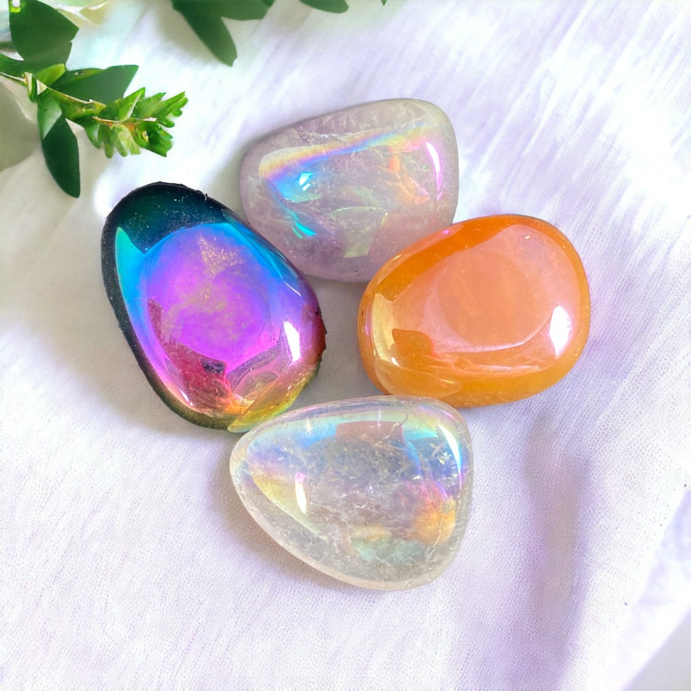 Aura Quartz Tumble Stone Set - Featuring Angel, Tangerine, Amethyst, and Titanium Aura Quartz Tumble Stones - Set of 4 Pocket Crystals